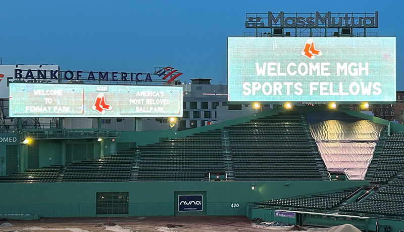 picture of the scoreboard at Fenway Park, which says Welcome MGH Sports Fellows