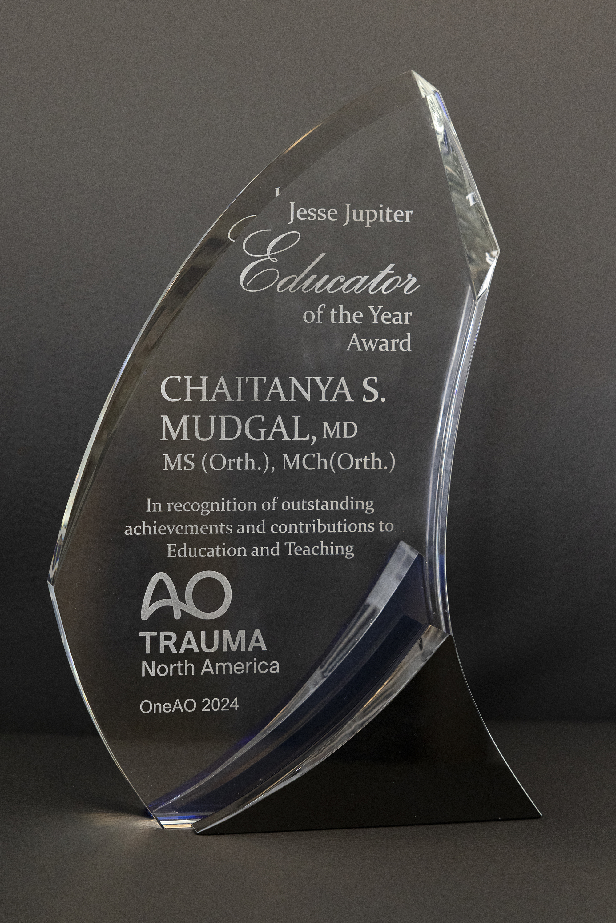 image of the award given to Dr. Chiatanya Mudgal as AO North America Educator of the Year