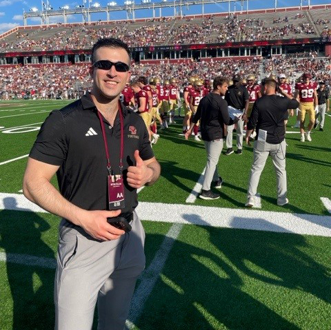 a sports medicine fellow on the sidelines during a Boston College football game
