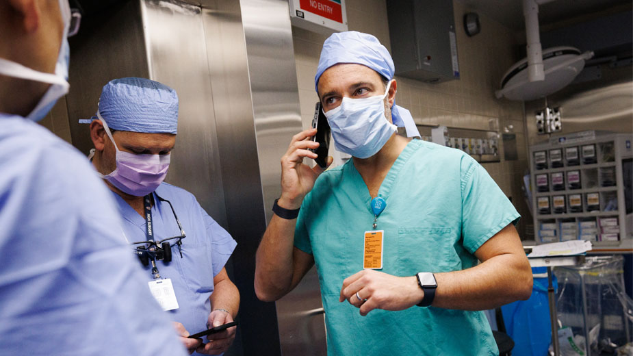 Dr. Riella giving Tim’s wife, Karen, the good news after the procedure that the surgery was a success.