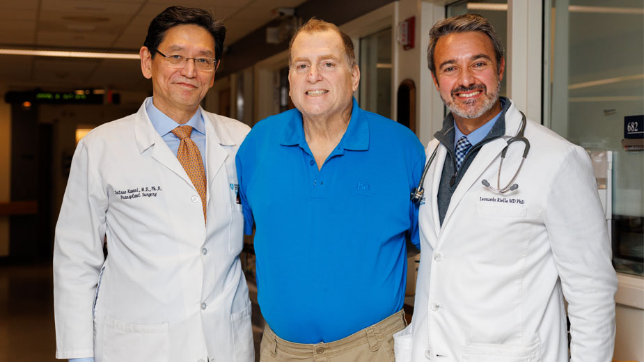 Tim with Dr. Tatsuo Kawai, left, and Dr. Leonardo V. Riella.