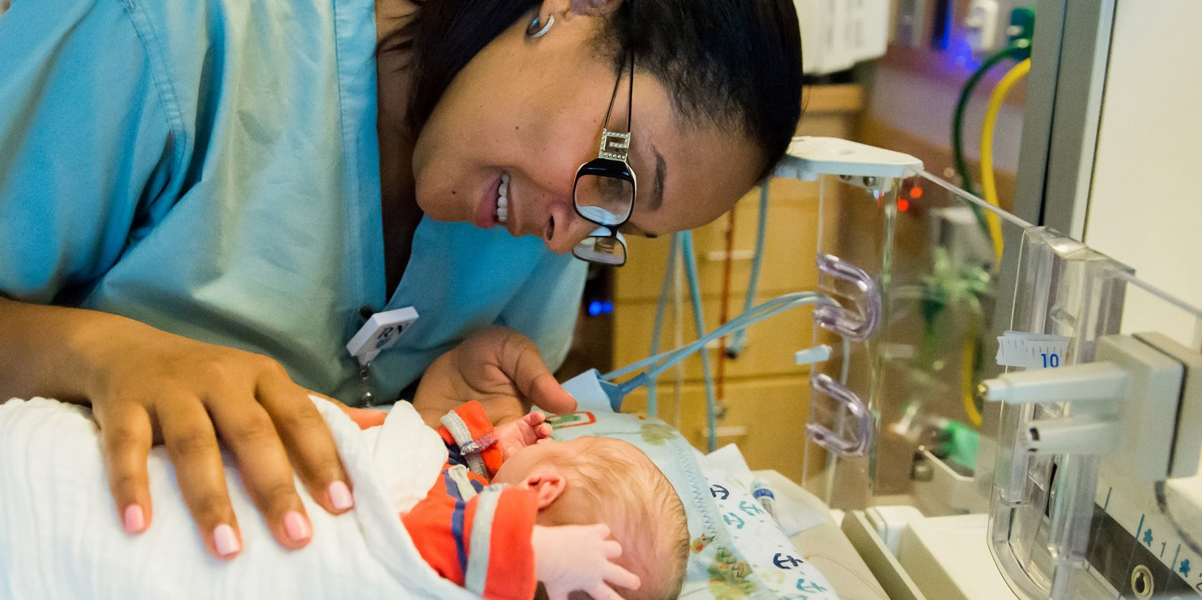 Nurse with newborn patient