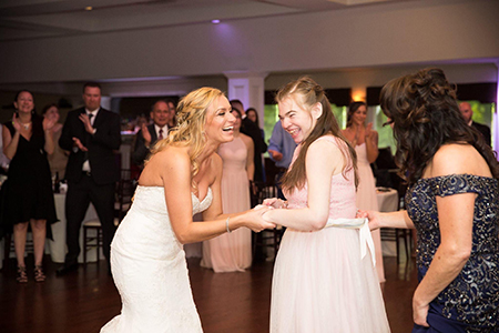 Kayla and Amy Hammond dance together at Kayla's wedding