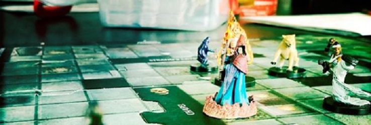 Aspire Guild Chronicles, with player pieces on a game board