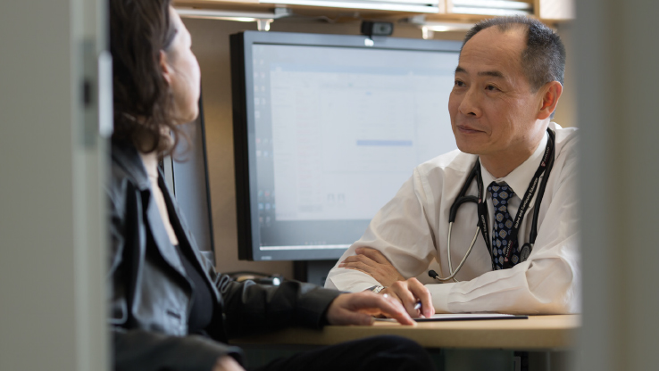 A patient meets with a doctor at an Executive Physical.