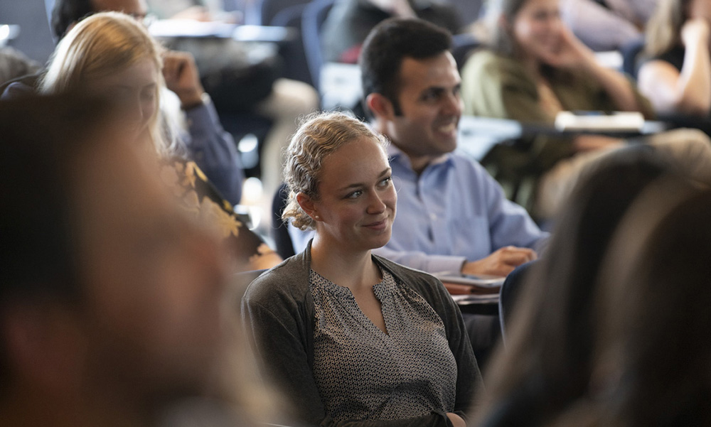 A student listens during a lecture. A student listens during a lecture.