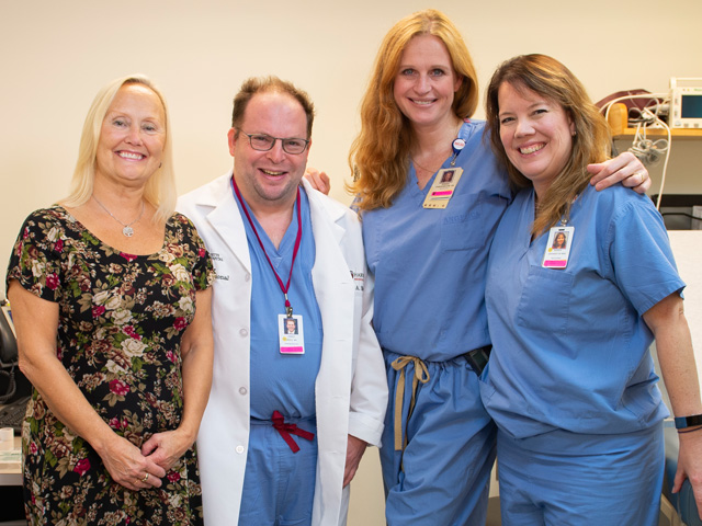 From left, Bobbie DiBattista with Dr. Joshua Hirsch and Nurse Practitioners Teresa Vanderboom and Marion Growney of the Interventional Spine Program.