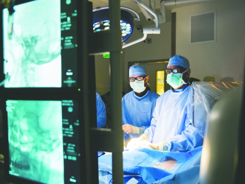 Surgeons in high-tech operating room