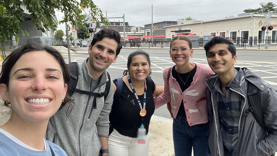 A group of people standing on the street