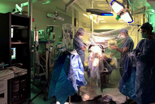 Surgeons in operating theater