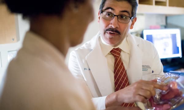 Fertility doctor with patients