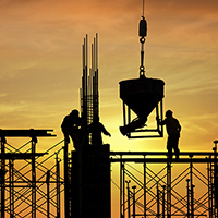 image of a work site at sunset