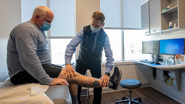 Scott Martin, MD, with a patient