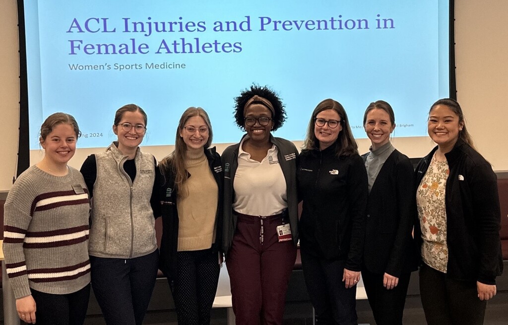 Members of the Women's Sports Medicine Program giving a presentation at Belmont High School about injury mitigation for female athletes