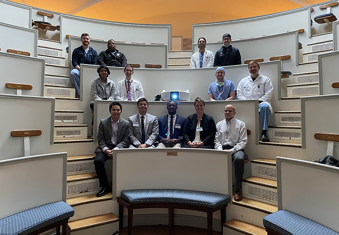 Academic Program attendees in the Bulfinch Building’s historic Ether Dome. Front row from left to right: Drs. Thuan Ly, Brandon Yuan, Milton Little, and Mitchel B. Harris (Chair, MGH Orthopaedic Surgery). 2nd Row: Drs. Sravya Challa (HCORP PGY 4), Phillip Grisdela (HCORP PGY 4), Vinicius Craveiro (Orthopaedic Trauma Fellow) and John Esposito (Orthopaedic Trauma and Arthroplasty Surgeon). 3rd Row: Drs. Harry Lightsey (HCORP PGY 5), Mark Fleming (Orthopaedic Trauma Surgeon), Stephen Maier (HCORP PGY 5), and Theodore Guild (HCORP PGY 4)