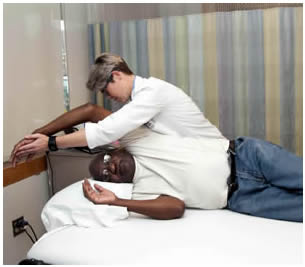 Physical Therapist working with patient