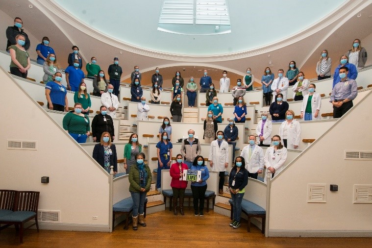Members of the Mass General Transplant Center posing for a team photo