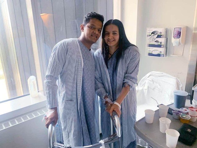 Jesus and Teresa in hospital gowns