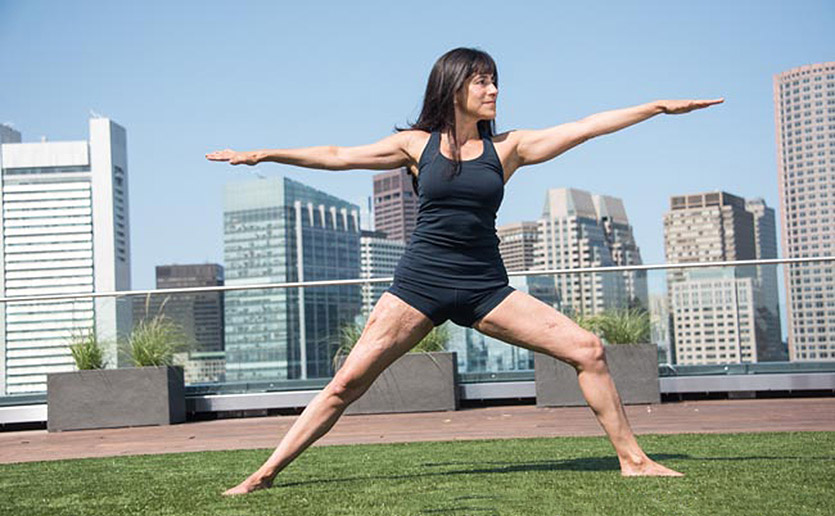 Joy Greene doing yoga