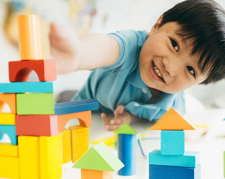 Child playing with blocks