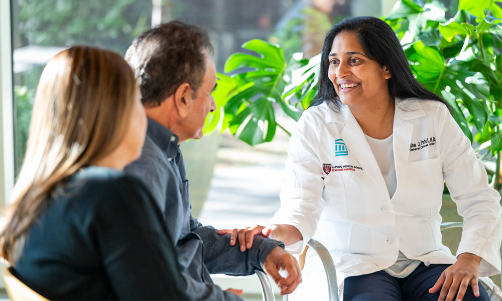 Manisha Patel, MD with a patient at Mass General Cancer Center. Manisha Patel, MD with a patient at Mass General Cancer Center.