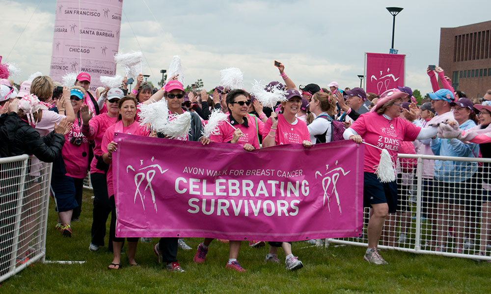 People at a walk for breast cancer survivors. People at a walk for breast cancer survivors.