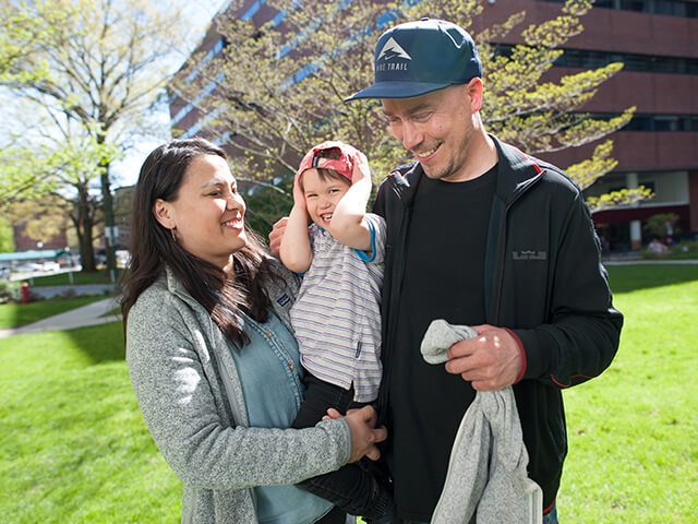 Patient Emilio with his mother and father