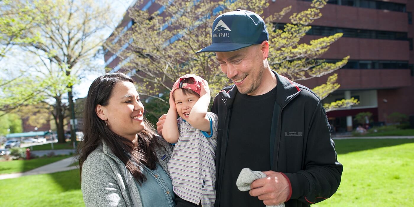 Patient Emilio with his mother and father