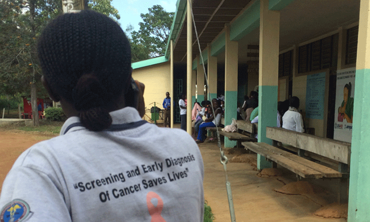 Lines of people in Africa waiting for a skin check. Lines of people in Africa waiting for a skin check.