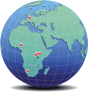 Globe with program spots in Africa and Europe marked with red dots.