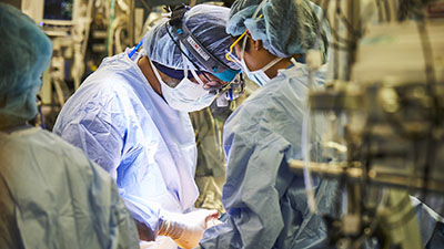 Arminder Jassar, MD, thoracic and cardiac surgeon, in the operating room. Arminder Jassar, MD, thoracic and cardiac surgeon, in the operating room.