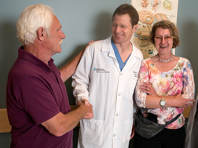 Aneurysm patient Joan Nelson with Dr. Rabinov and her husband Steve Nelson.