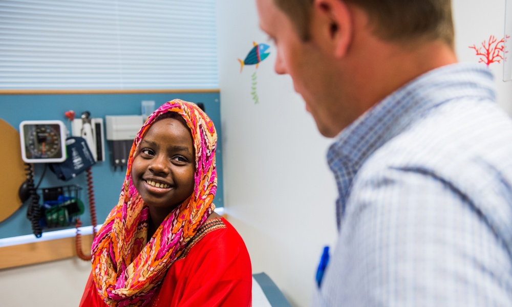 A patient consults her doctor A patient consults her doctor