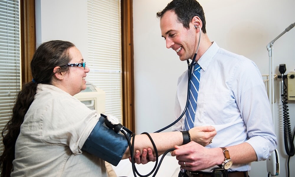 Doctor working with a patient Doctor working with a patient