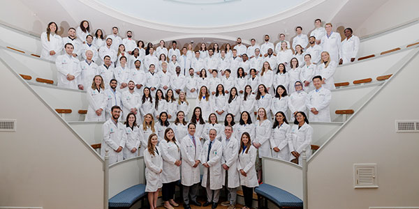 A group of residents in white coats in the Ether Dome. A group of residents in white coats in the Ether Dome.