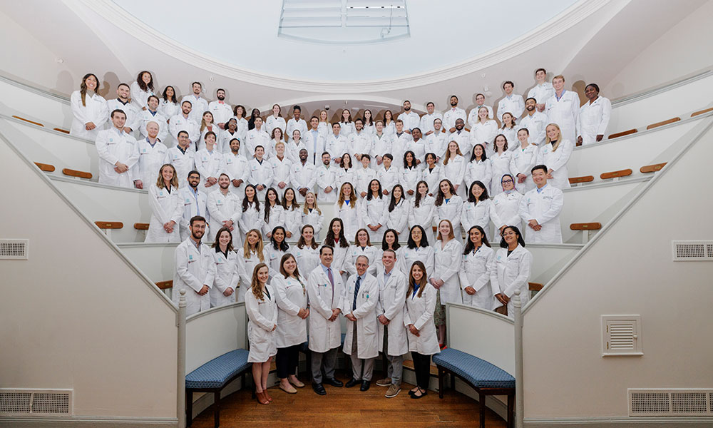 A group of residents in white coats in the Ether Dome. A group of residents in white coats in the Ether Dome.