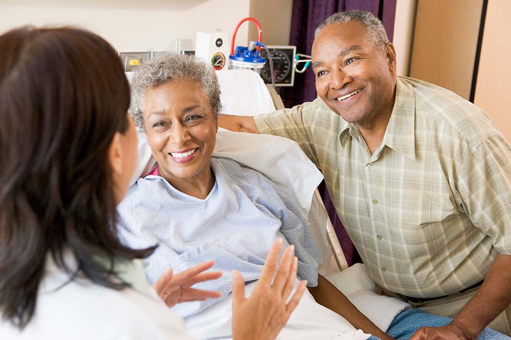 Stroke physician consults with patient and family Stroke physician consults with patient and family