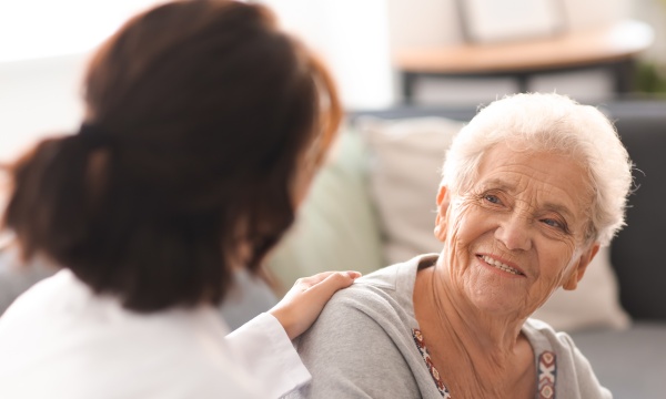 Doctor speaking with older female patient Doctor speaking with older female patient