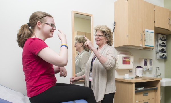 Dr. Thiele and a patient