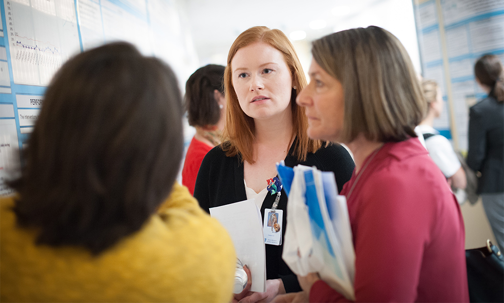 Three nursing staff members. Three nursing staff members.