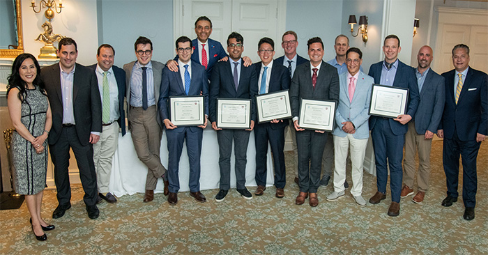 Attending surgeons from the Department of Orthopaedic Surgery’s Sports Medicine and Shoulder Services pose with the latest cohort of graduating fellows