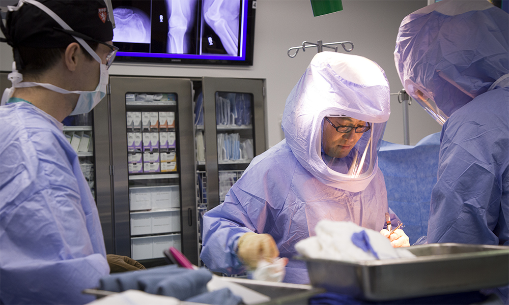 Dr. Young-Min Kwon, a hip and knee replacement surgeon, during surgery Dr. Young-Min Kwon, a hip and knee replacement surgeon, during surgery