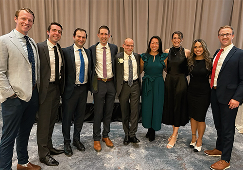 Mitchel Harris, MD, Chief of the Department of Orthopaedic Surgery, with a group of residents at the Commitment to a Cure Gala in Boston where he received the Dr. Marion Ropes Physician's Achievement Award for Patient Excellence from the Arthritis Foundation
