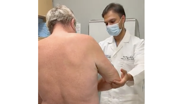 Rohit Garg, MD and his patient, Matthew, before brachial plexus surgery Rohit Garg, MD and his patient, Matthew, before brachial plexus surgery