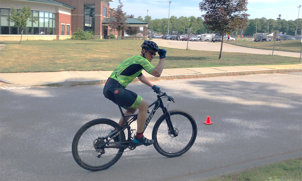 Sasha competing in a triathlon Sasha competing in a triathlon