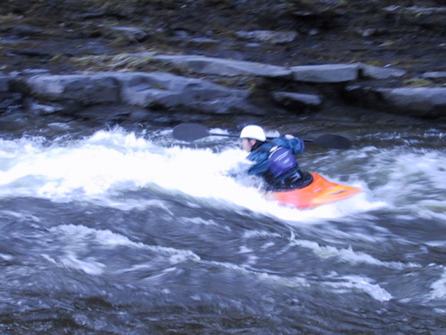 Sasha, a patient who saw orthopedic specialists in Hand and Foot & Ankle, kayaking