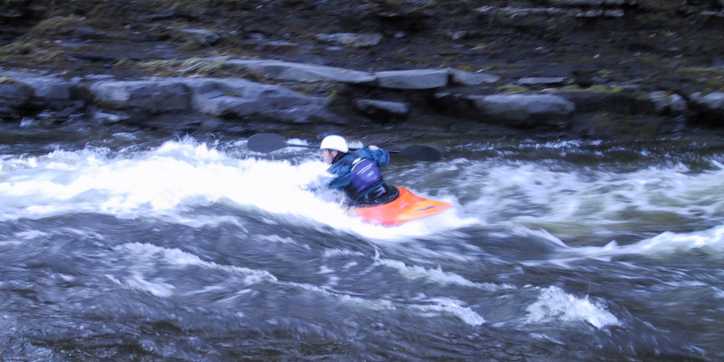 Sasha, a patient of Dr. Mudgal and Dr. Waryasz, kayaking after successful surgeries.