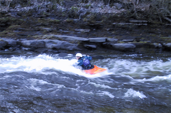 Sasha, a patient who saw orthopedic specialists in Hand and Foot & Ankle, kayaking