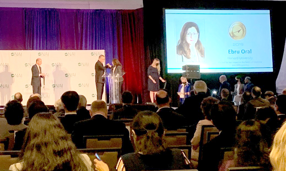Ebru Oral, PhD, accepting her medal at the National Academy of Inventors Induction Ceremony Ebru Oral, PhD, accepting her medal at the National Academy of Inventors Induction Ceremony