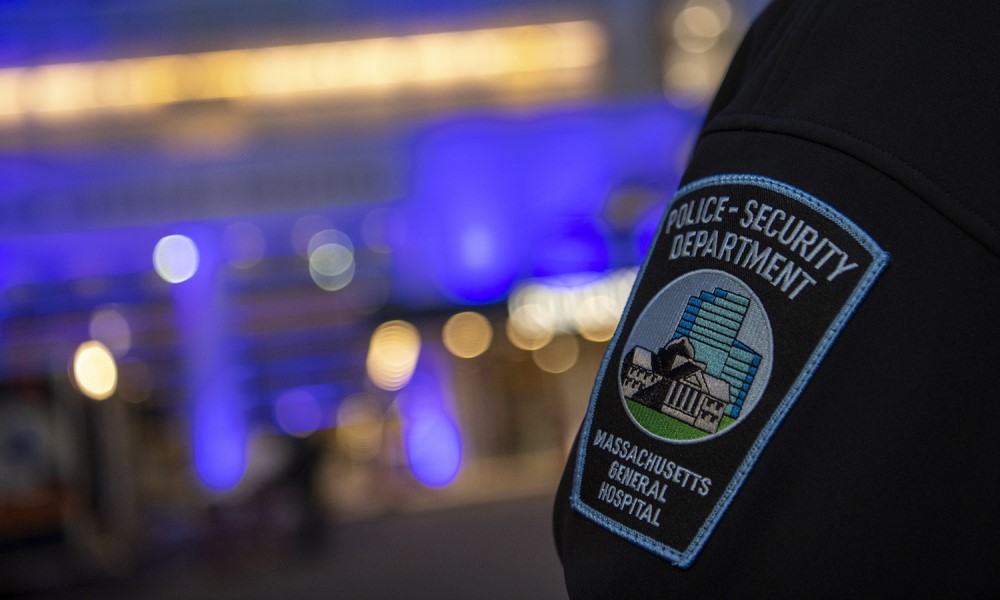 Closeup of security officer's arm showing the Mass General Police & Security patch. Closeup of security officer's arm showing the Mass General Police & Security patch.